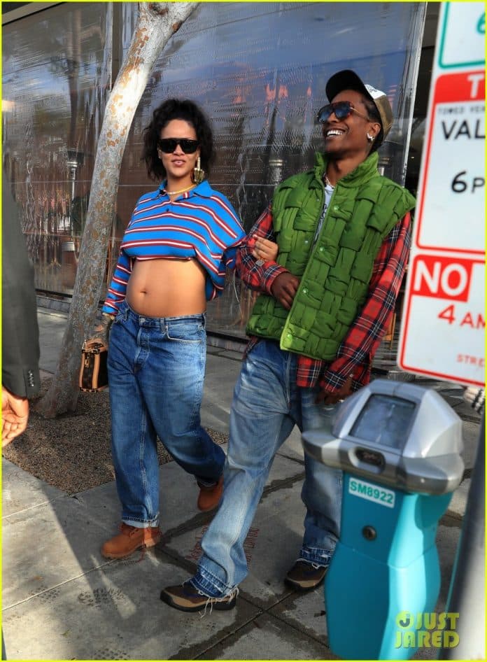 Pregnant Rihanna transforms a polo blouse that cost four figures into a bump-baring crop top