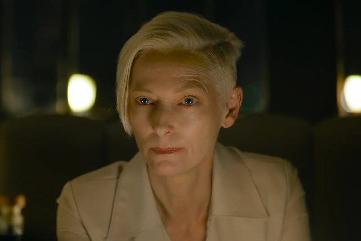 Tilda Swinton as "The Expert"