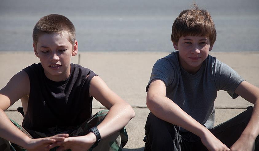 Jacob Lofland as Neckbone in mud movie