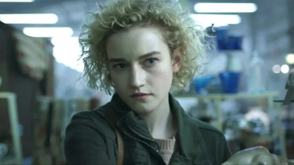 Julia Garner as Justine Gandy
