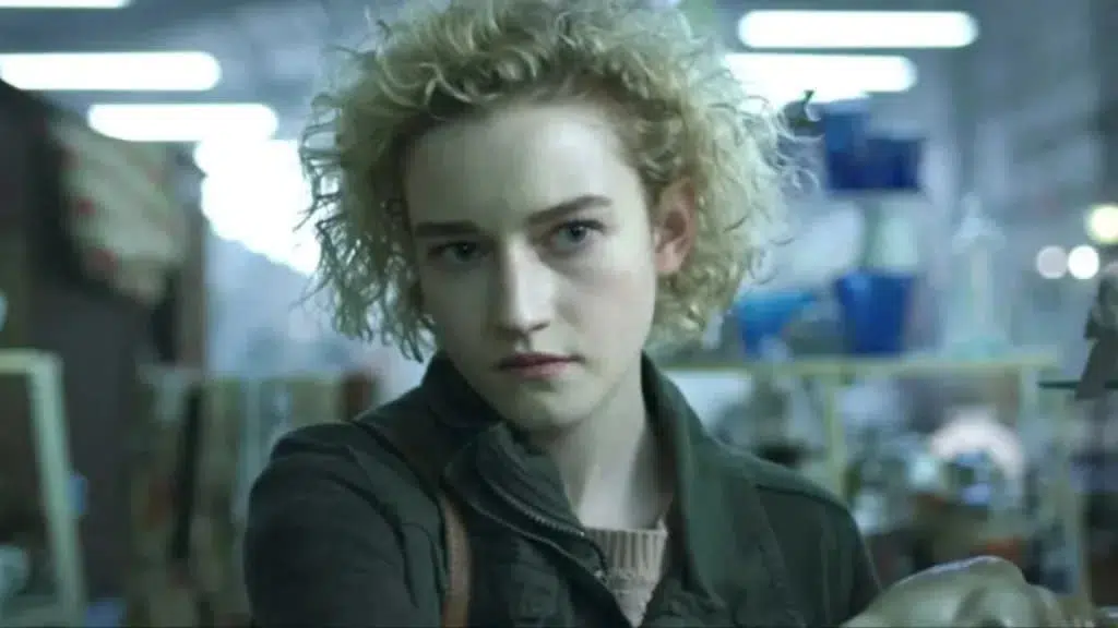 Julia Garner as Justine Gandy